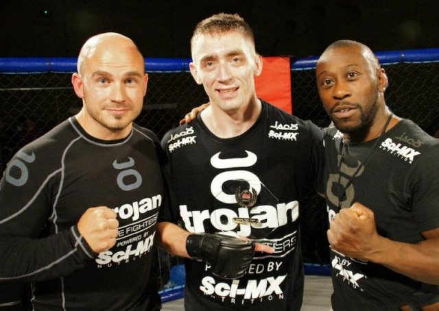 Dan Richards(owner) Piotr Ptasinski(fighter) Paul Sutherland (owner)
