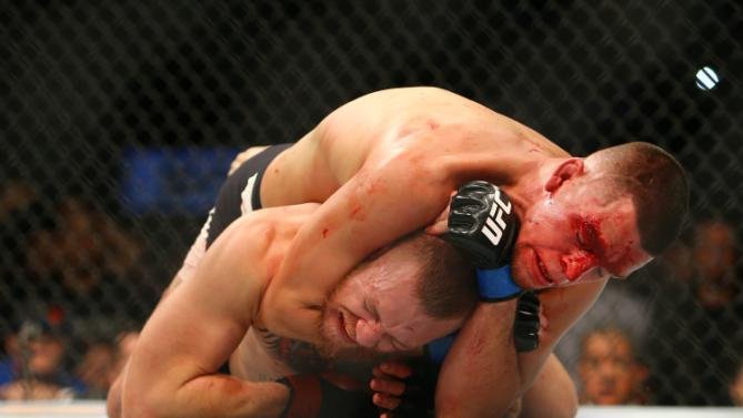LAS VEGAS, NV - MARCH 5: Nate Diaz applies a choke hold to win by submission against Conor McGregor during UFC 196 at the MGM Grand Garden Arena on March 5, 2016 in Las Vegas, Nevada. (Photo by Rey Del Rio/Getty Images)
